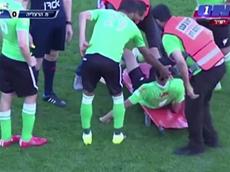 Captain carries his teammate o...
